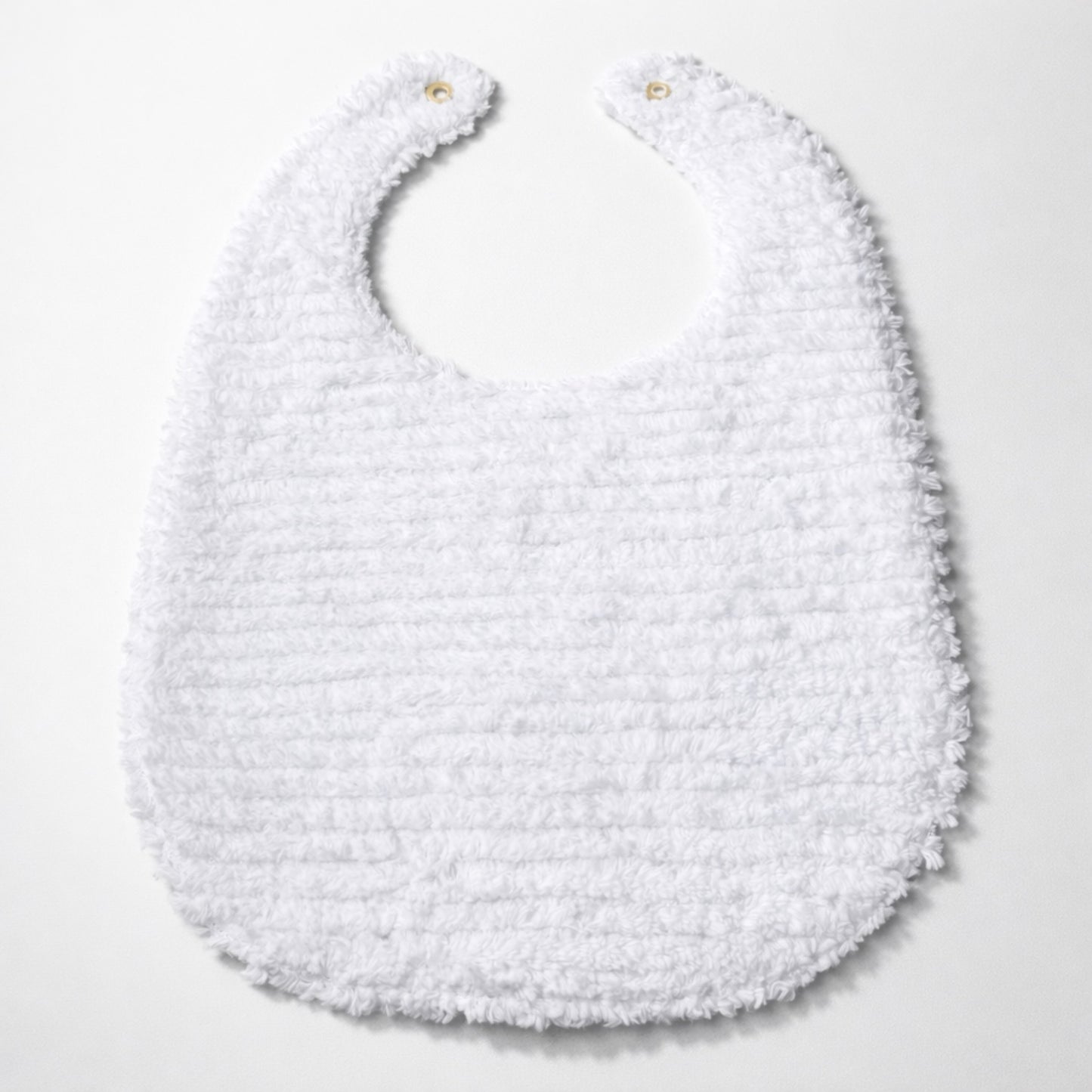 White textured bib on a white background
