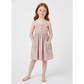 Young girl wearing a pink dress on a white background