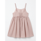 Pink dress with lace-up front on a white background