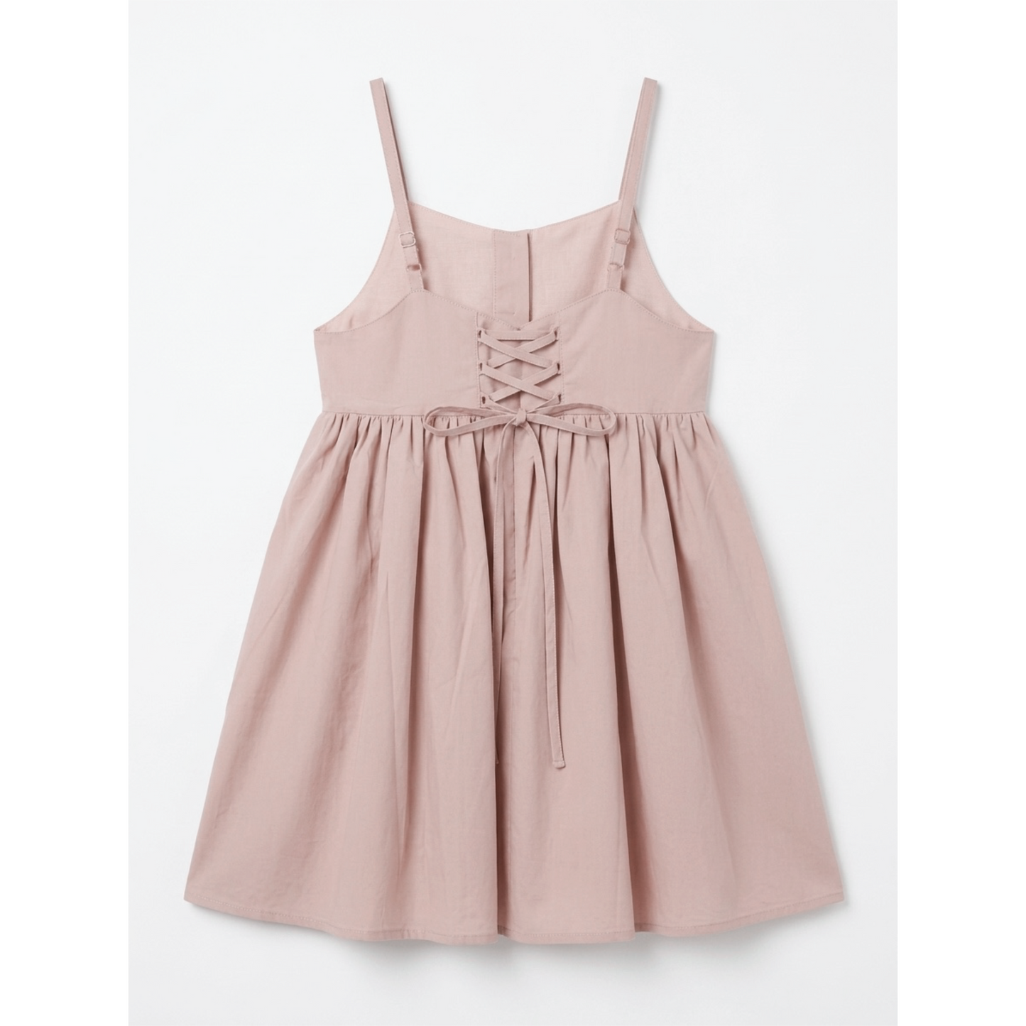 Pink dress with lace-up front on a white background