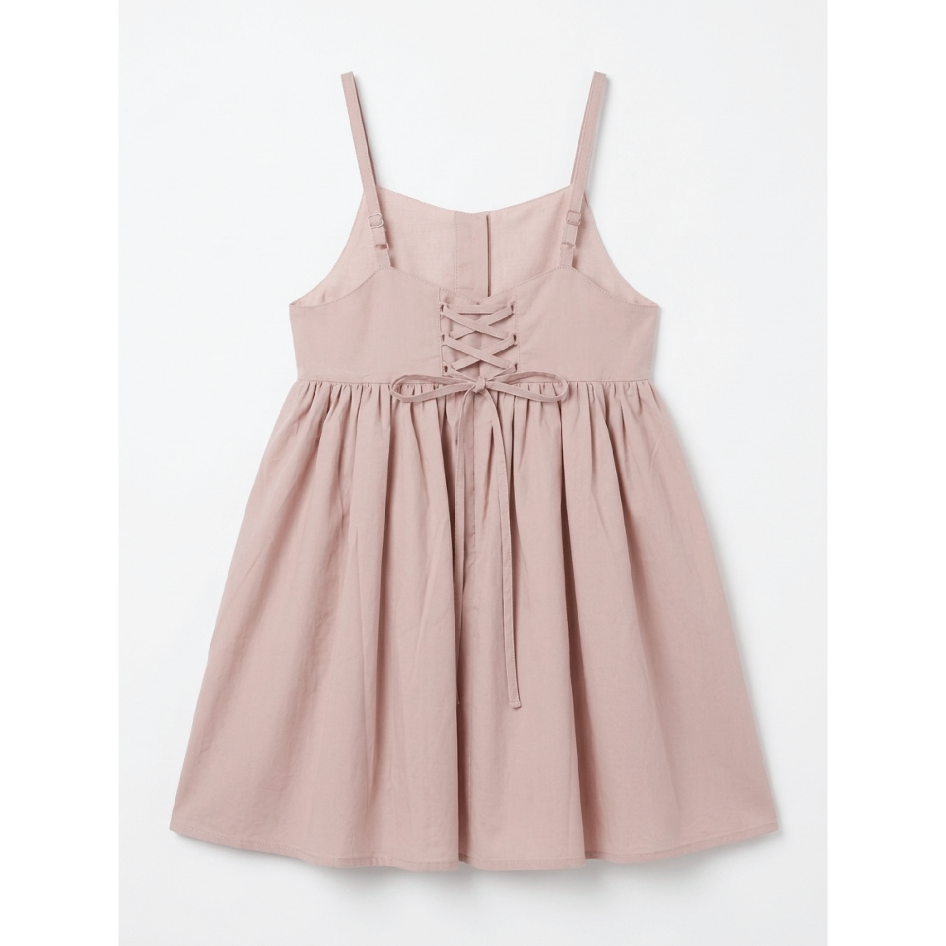 Pink dress with lace-up front on a white background