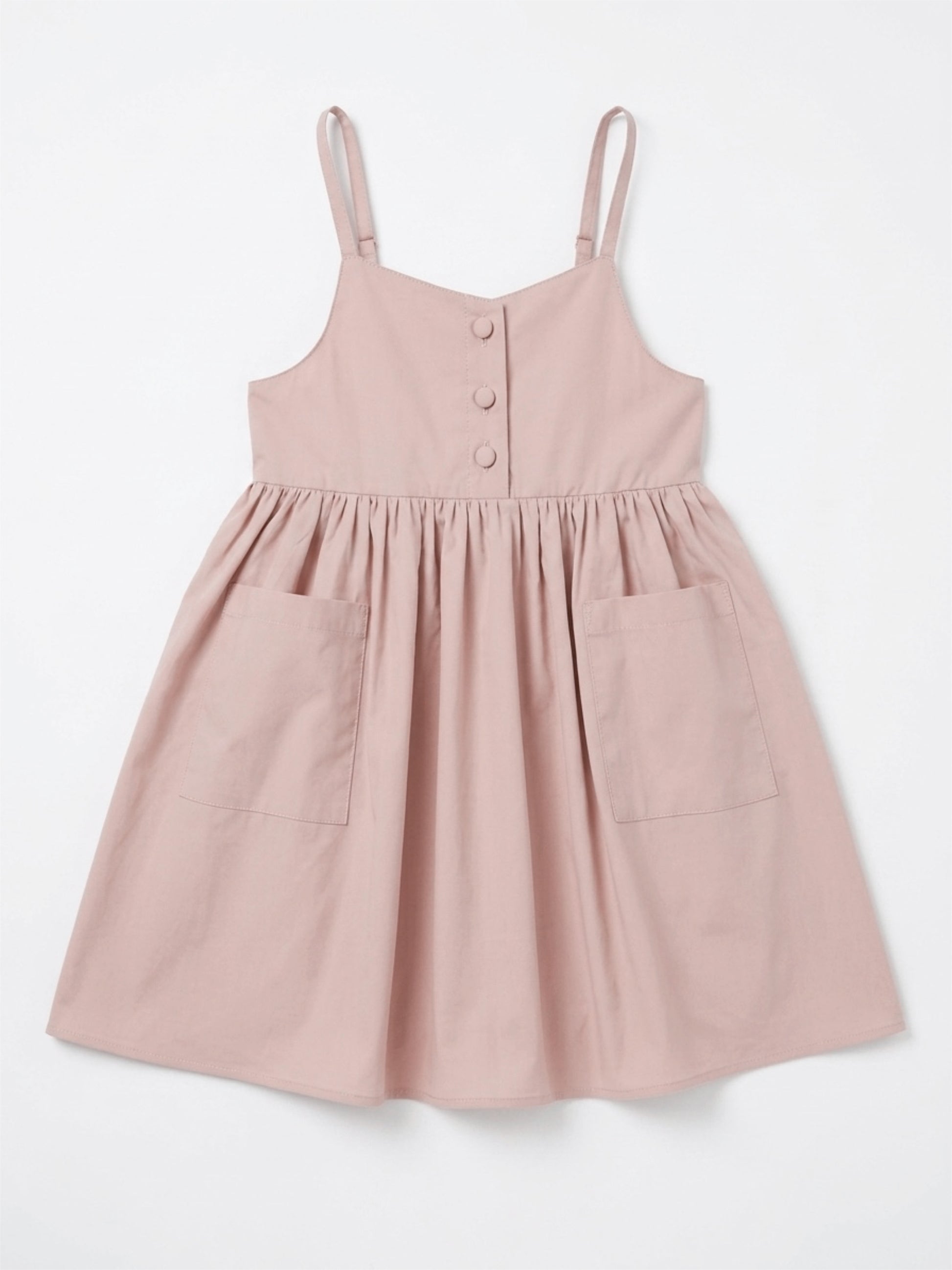 Pink dress with thin straps on a white background