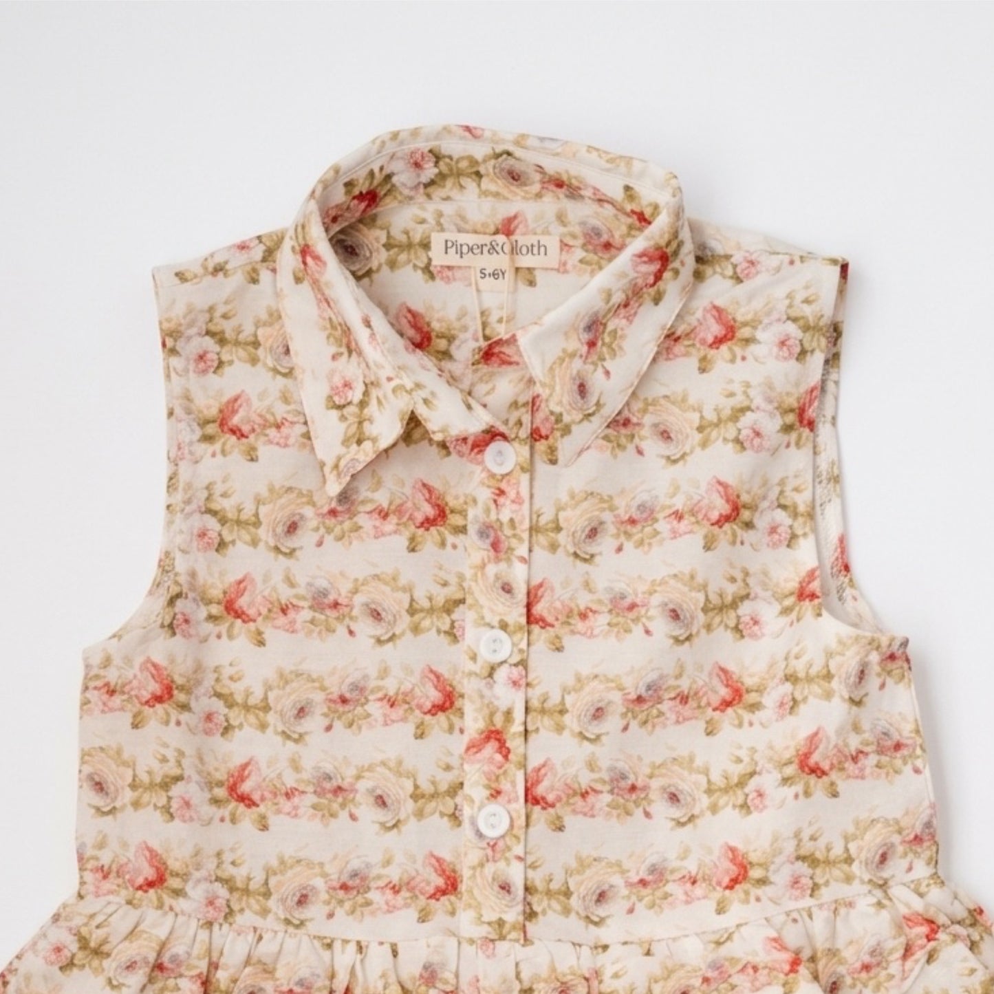 Floral patterned vest on a white background