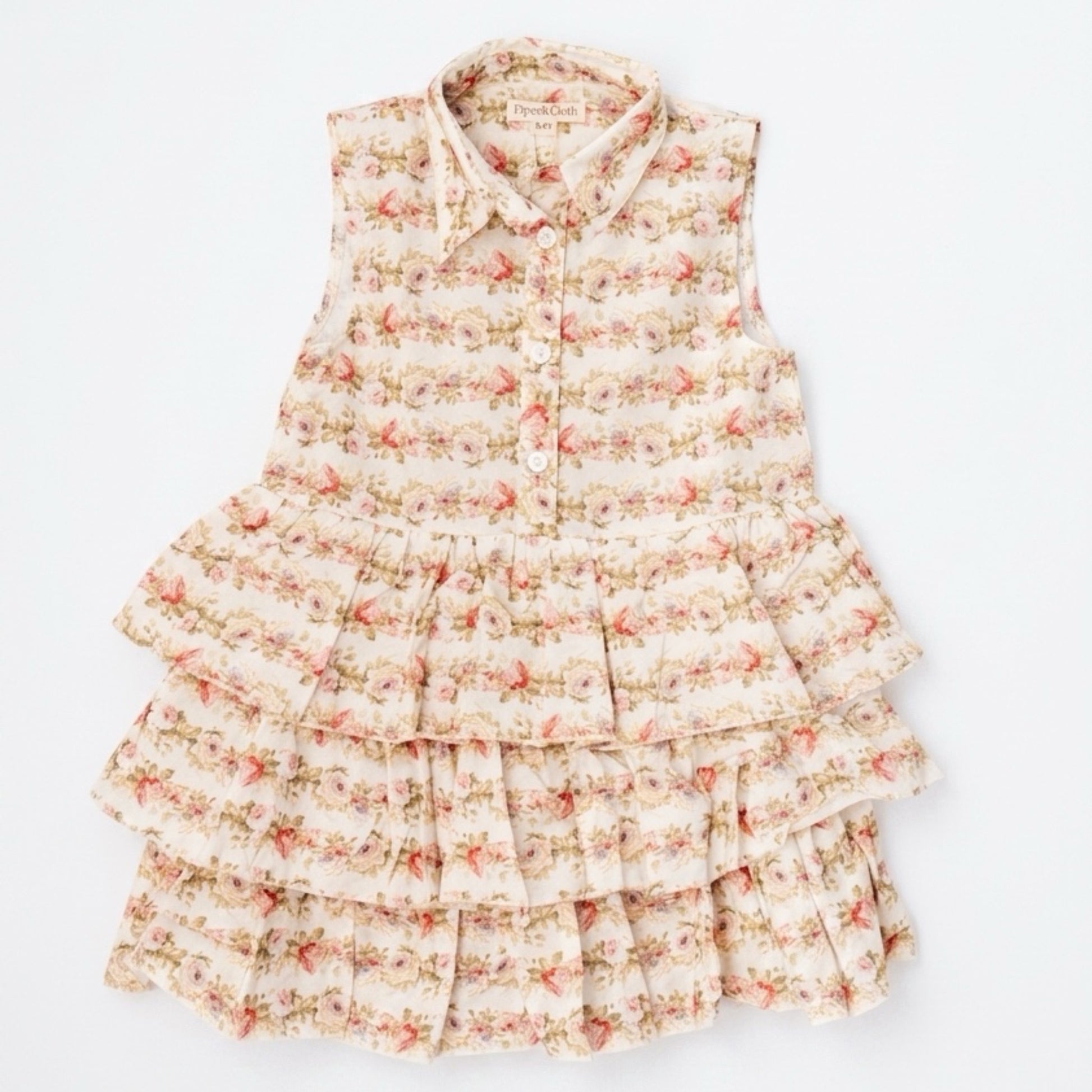 Floral tiered dress on a white background