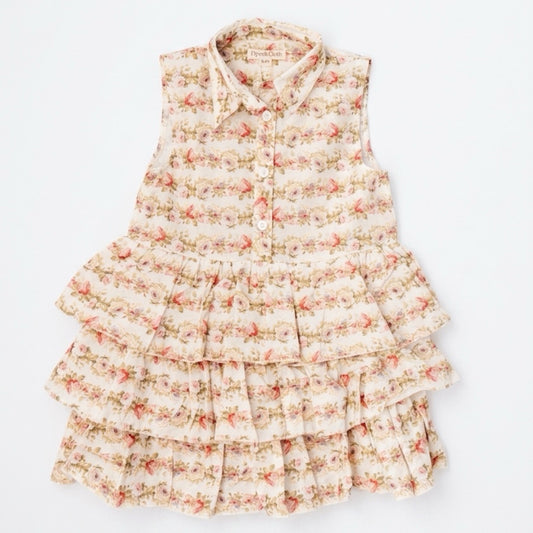 Floral tiered dress on a white background