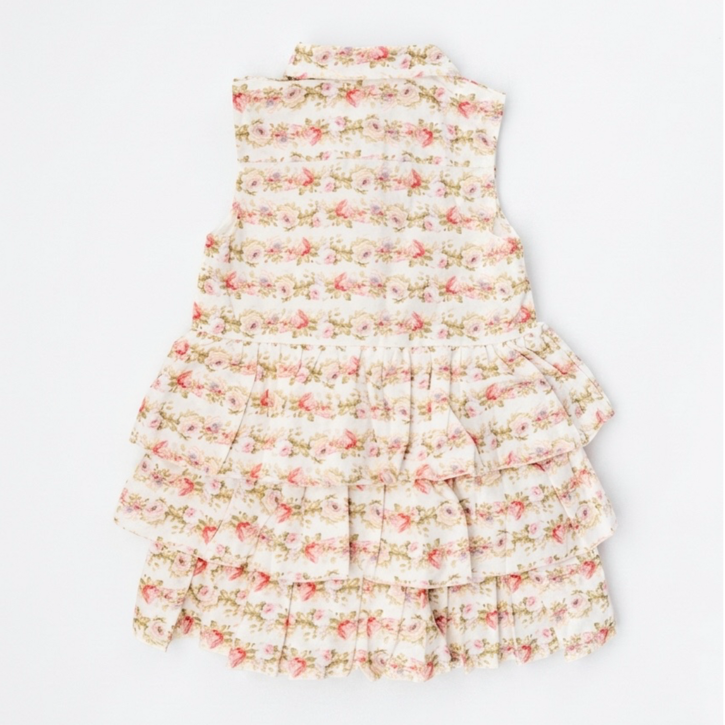 Floral dress with ruffled layers on a white background