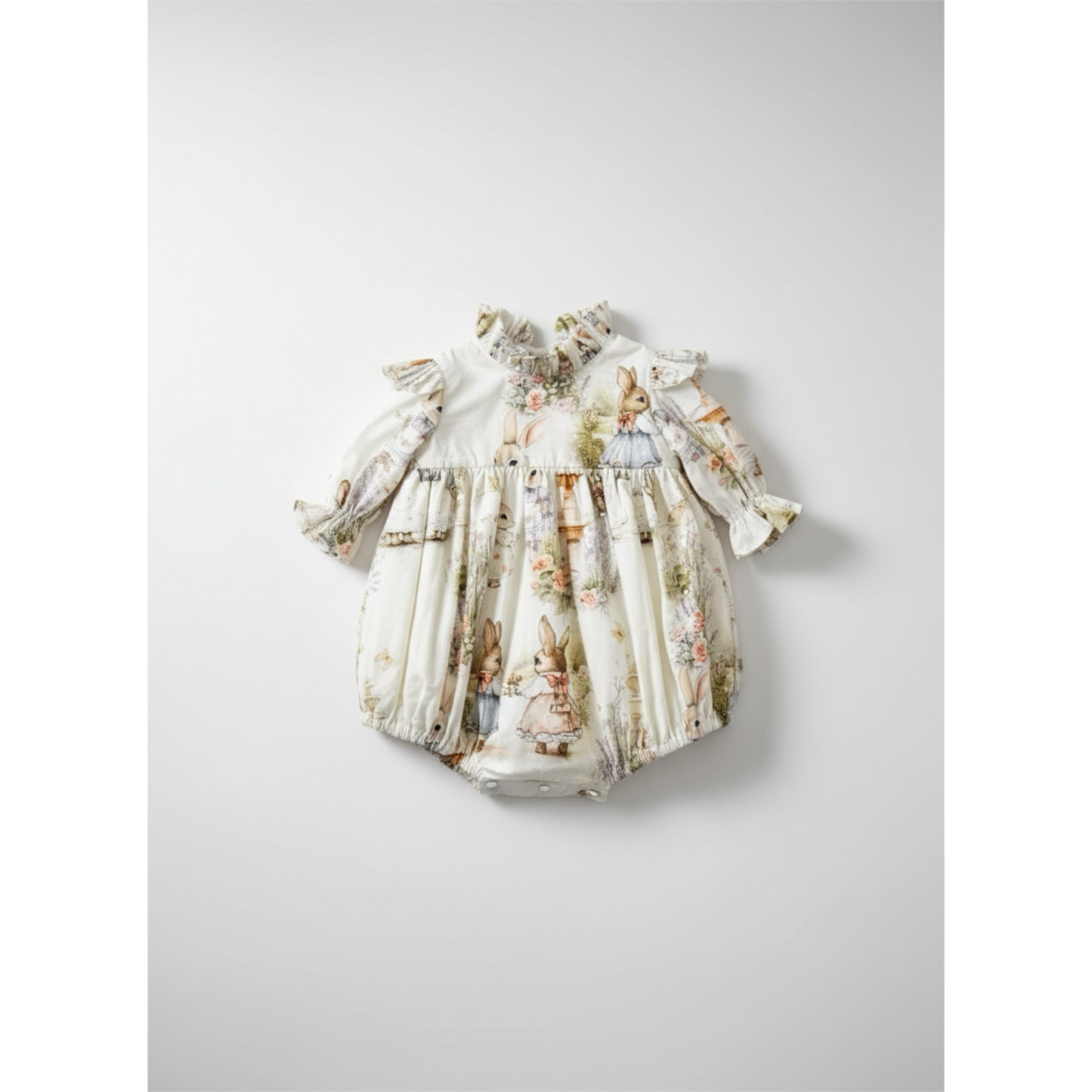 Baby romper with three-quarter  sleeve ruffle stand collar bubble with covered buttons at the back, floral and rabbit character print on a white background