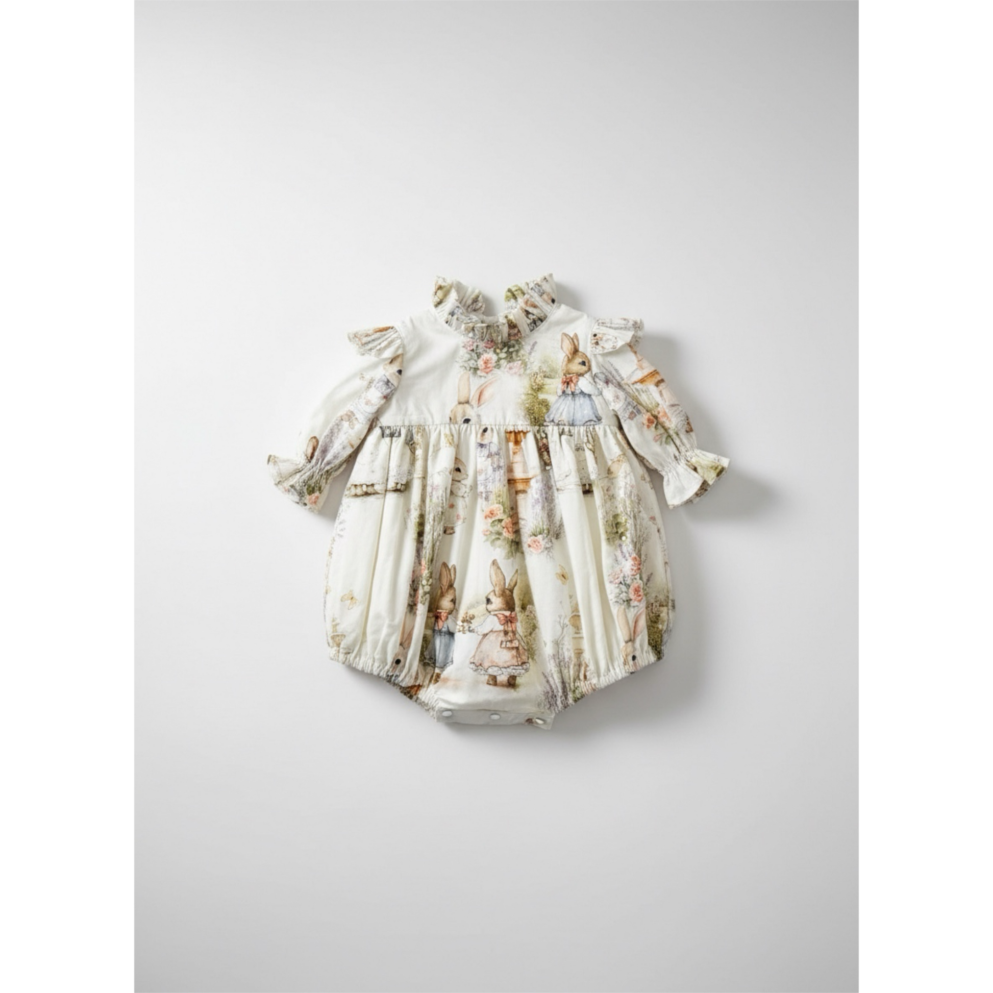 Baby romper with three-quarter  sleeve ruffle stand collar bubble with covered buttons at the back, floral and rabbit character print on a white background
