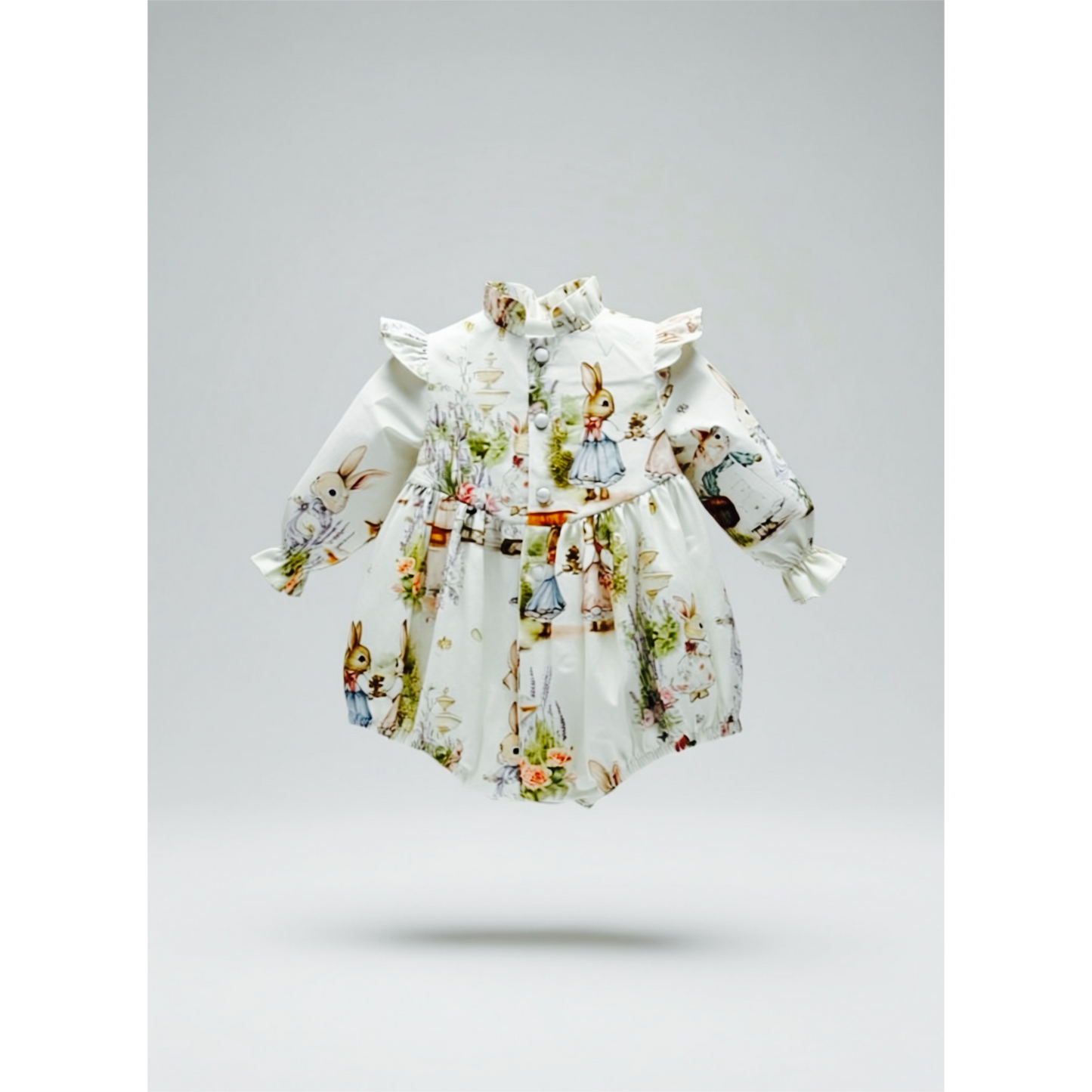 Children's long sleeve ruffle stand collar bubble with covered buttons at the back, floral and rabbit character print on a white background