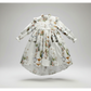 Children's dress with Bramble Rabbit print on a gray background