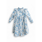White dress with blue floral pattern on a white background