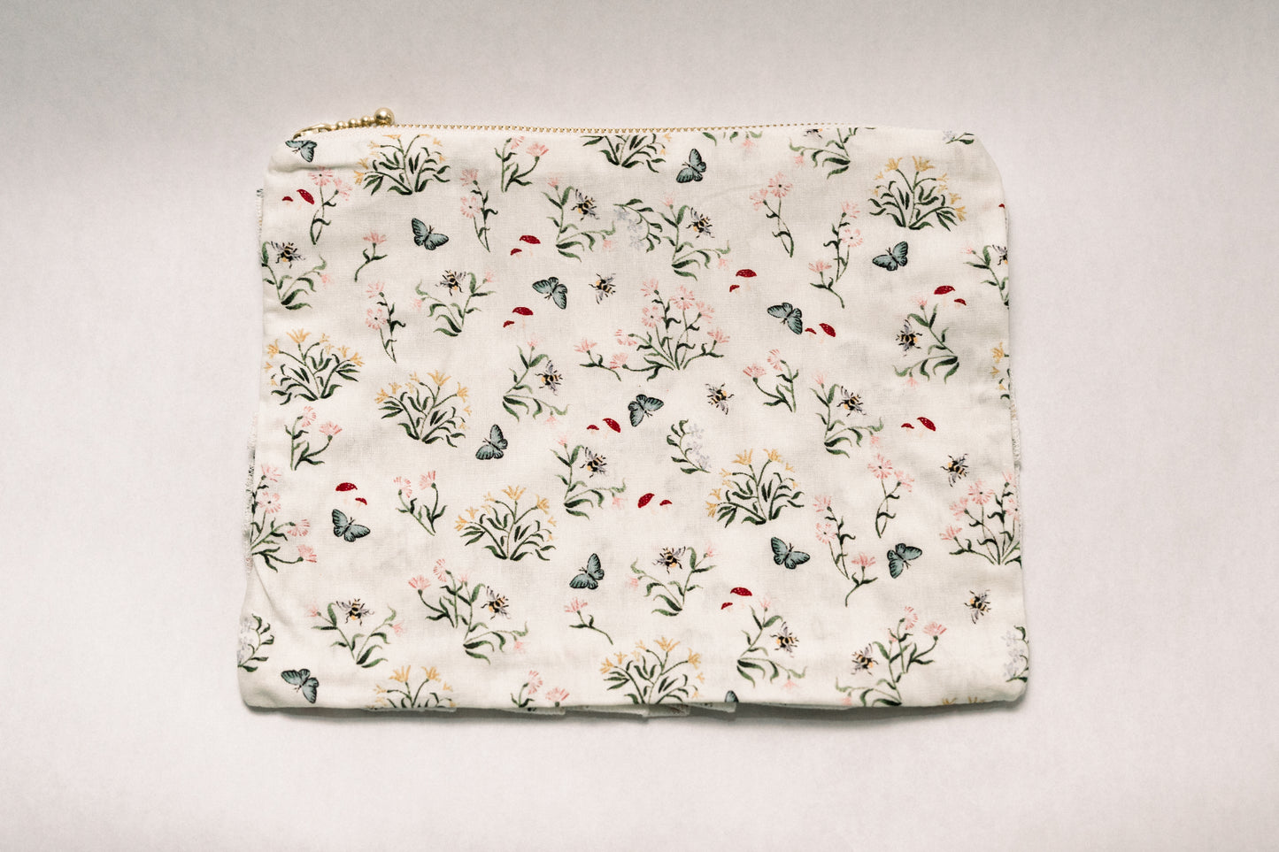 Butterfly Glade | Timeless Floral Ruffle Zipper Pouch