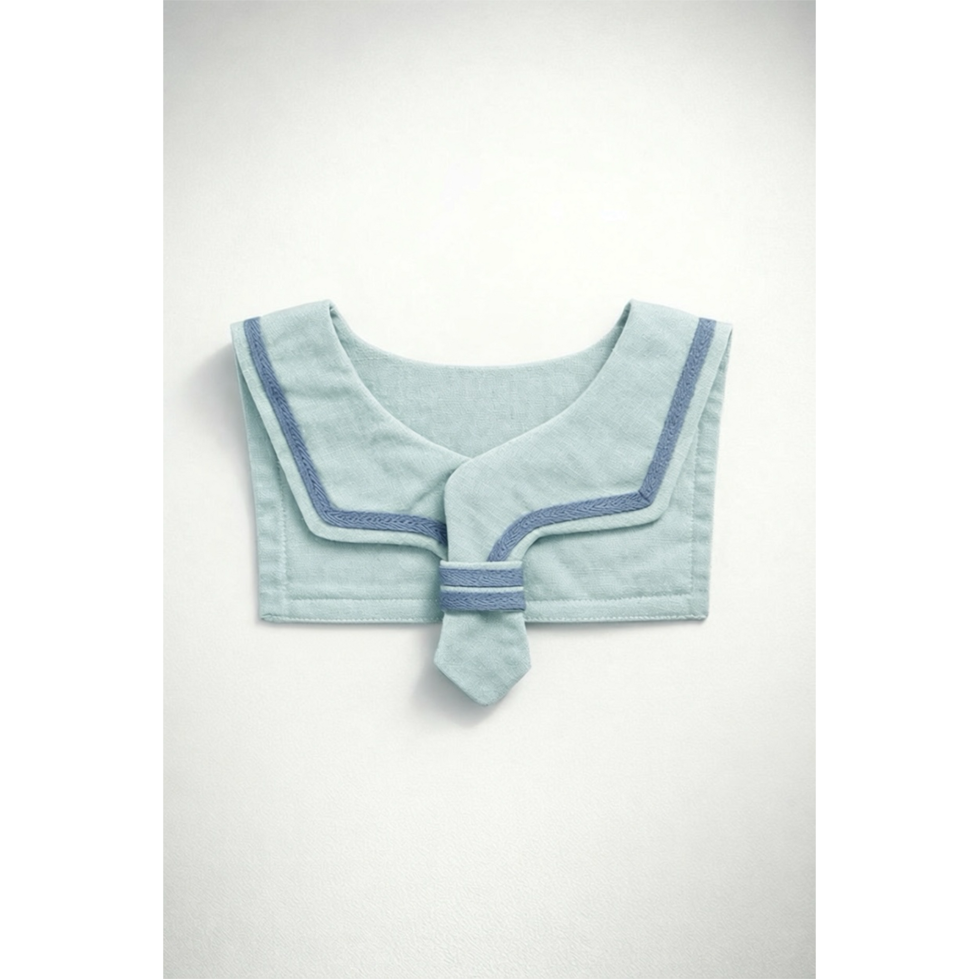 Light blue sailor-style collar with dark blue trim on a white background