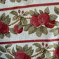 Fabric with red apple pattern on a white background