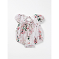 Floral baby romper on a white background