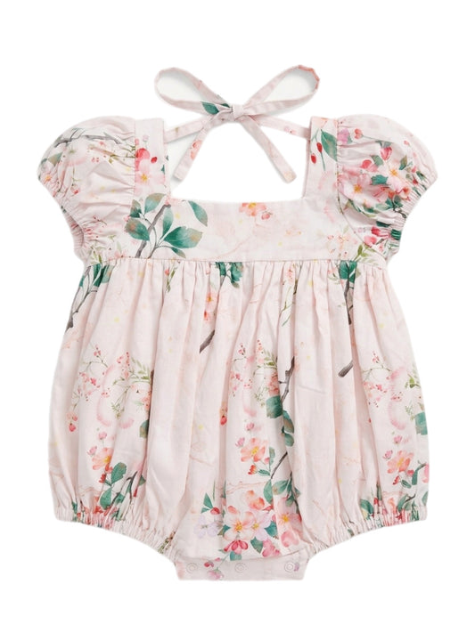 Floral baby romper with ruffled sleeves on a white background