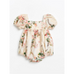 Floral baby romper with matching hat on a white background