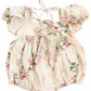 Floral baby romper on a white background