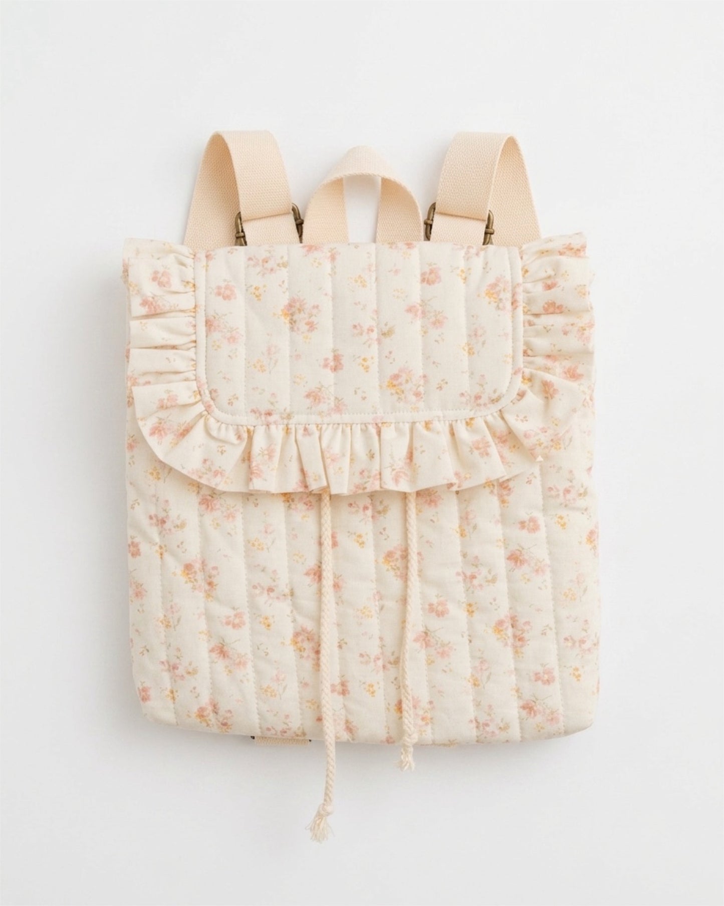Floral-patterned backpack with ruffled details on a white background