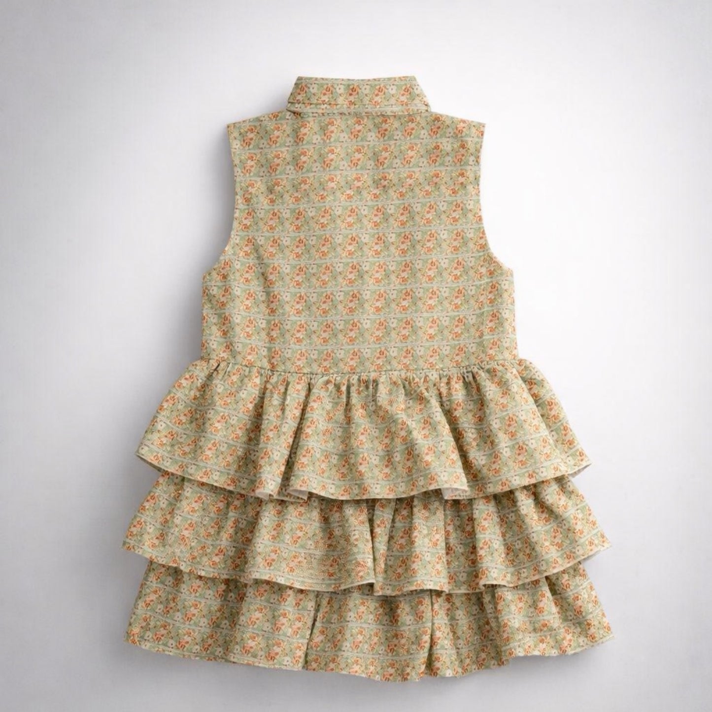 Floral tiered dress on a white background