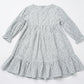 Gray dress with floral pattern on a white background