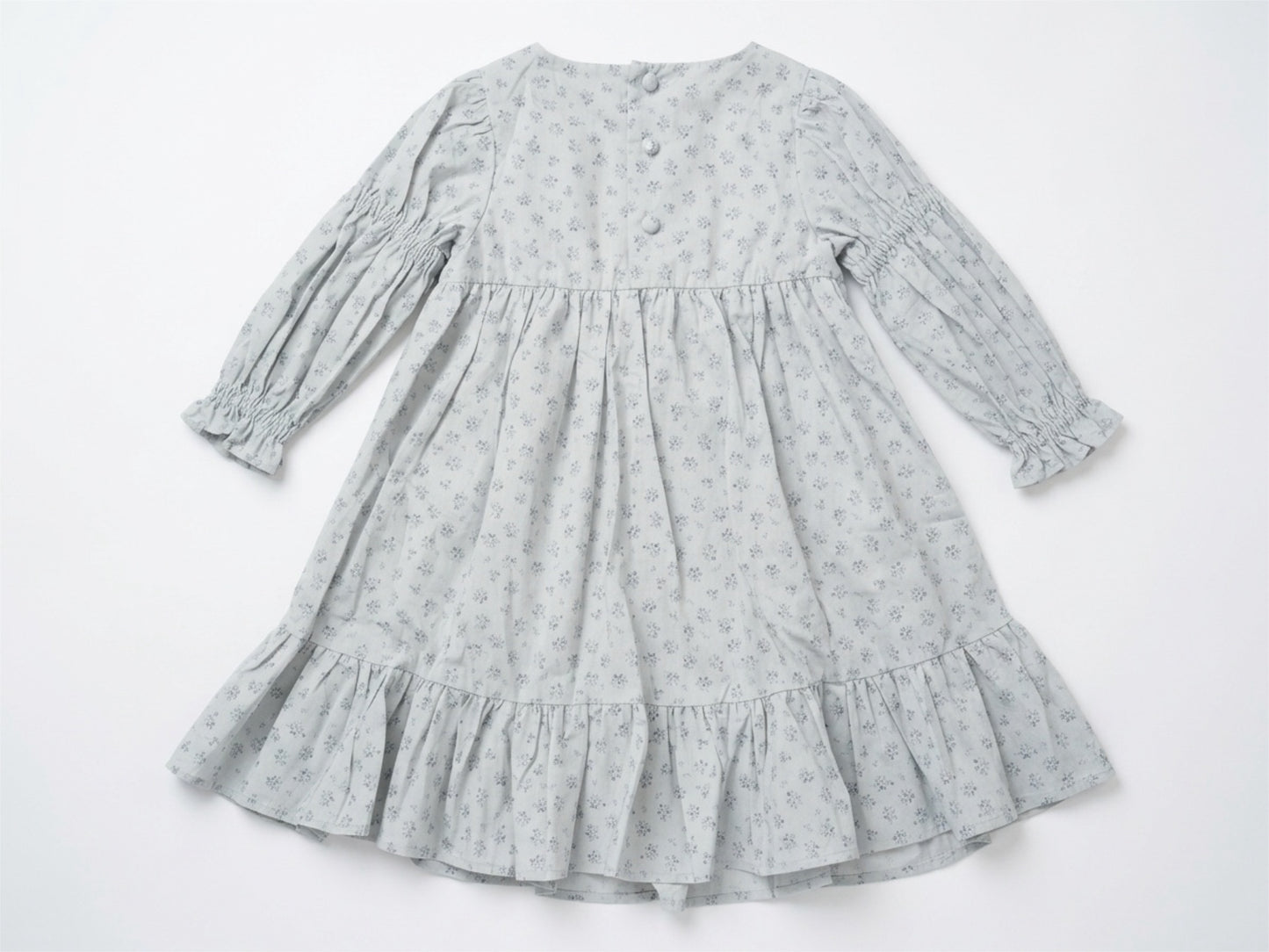 Gray dress with floral pattern on a white background