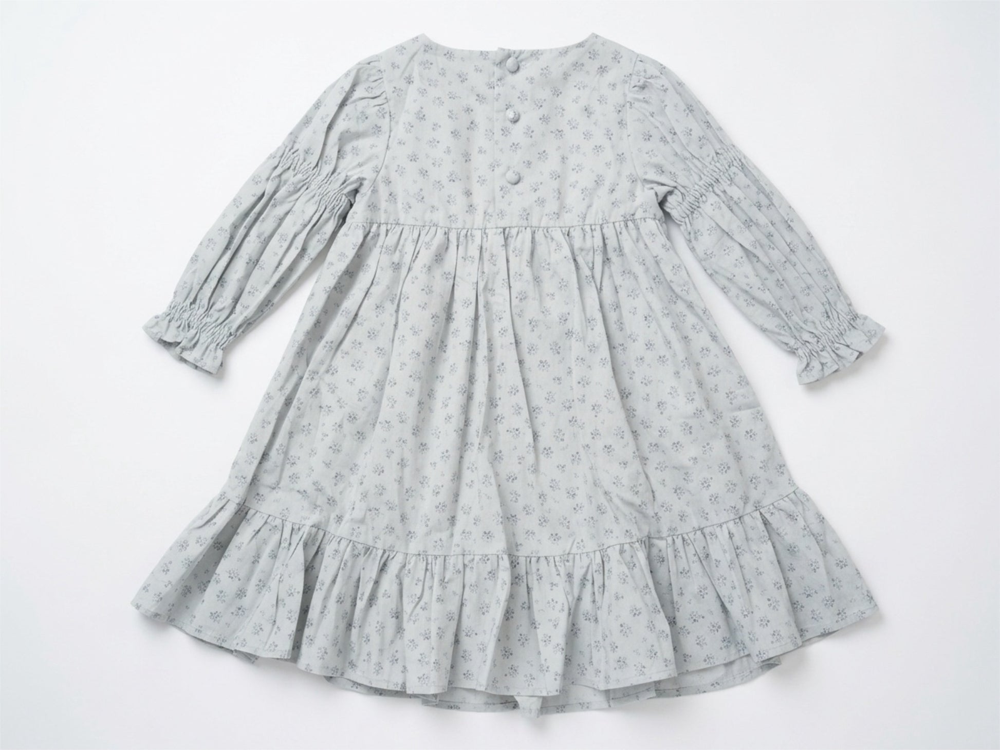 Gray dress with floral pattern on a white background