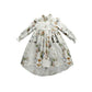 Children's dress with Bramble Rabbit print on a white background