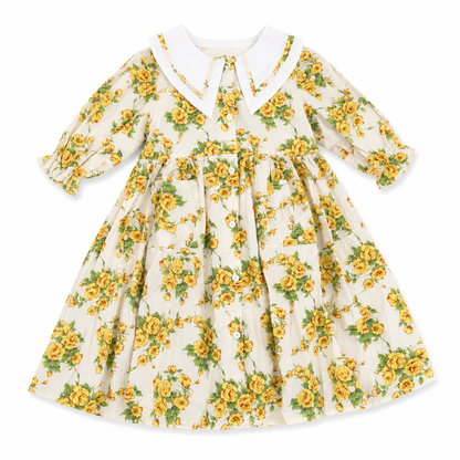 Floral dress with yellow flowers on a white background