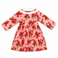 Pink dress with red floral pattern on a white background