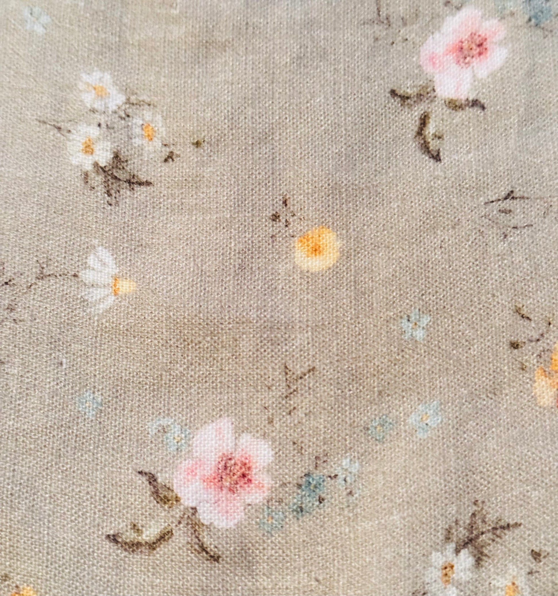 Floral pattern on a textured fabric background