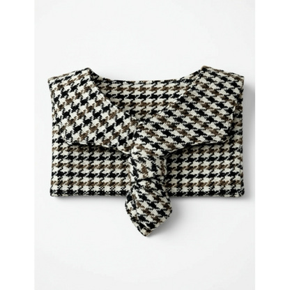 Sailor collar houndstooth patterned wool fabric on a white background
