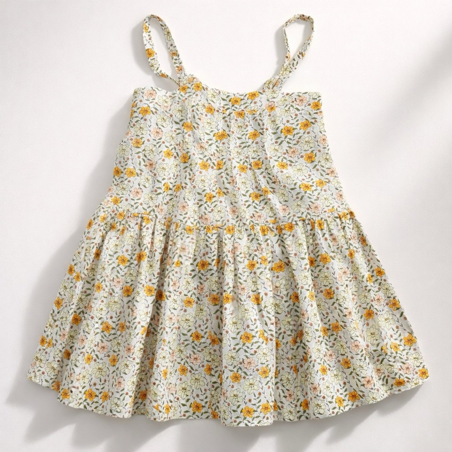 Floral dress with yellow flowers on a white background