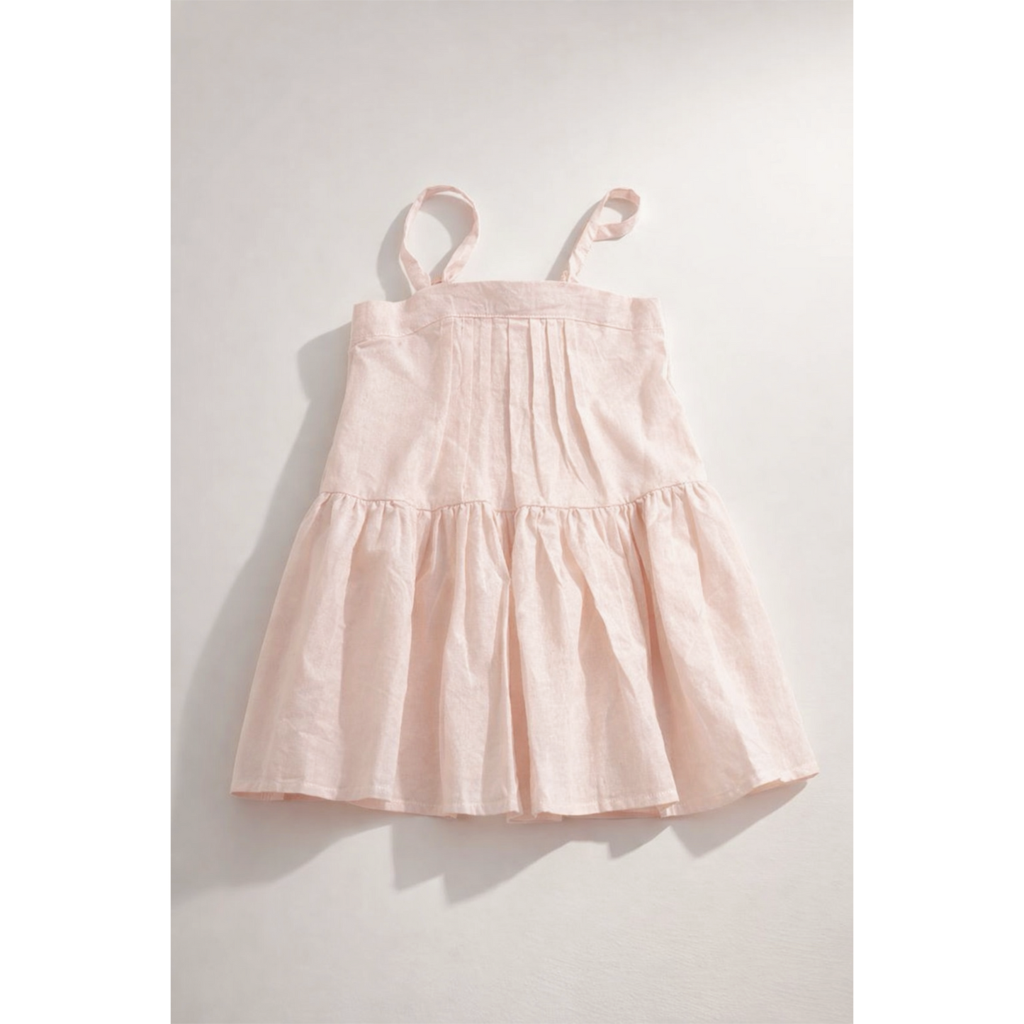 Pink dress on a white background