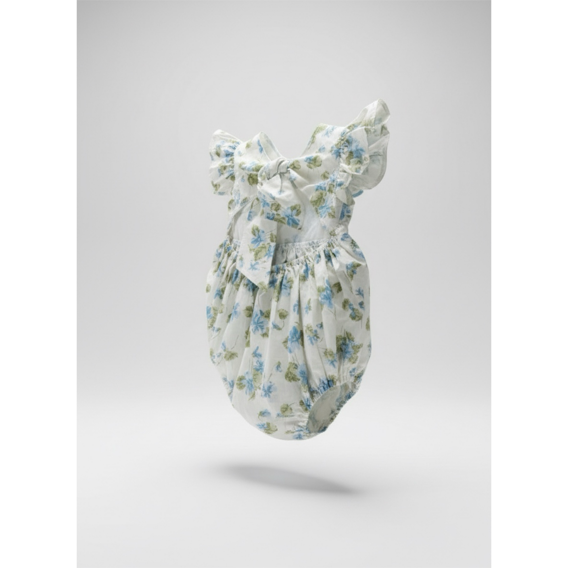 Floral Josie Romper  baby romper on a light gray background