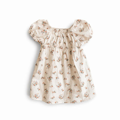 Floral dress with puff sleeves on a white background