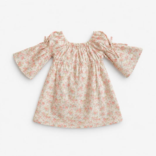 Floral dress with long sleeves on a white background