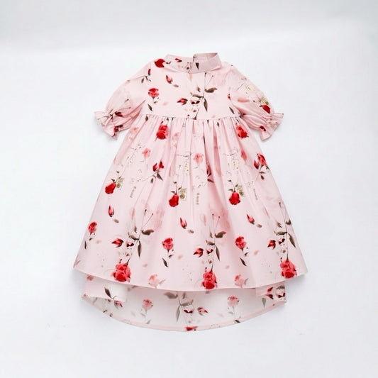 Pink floral dress on a white background