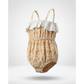Baby romper with floral pattern and white ruffle on a light gray background
