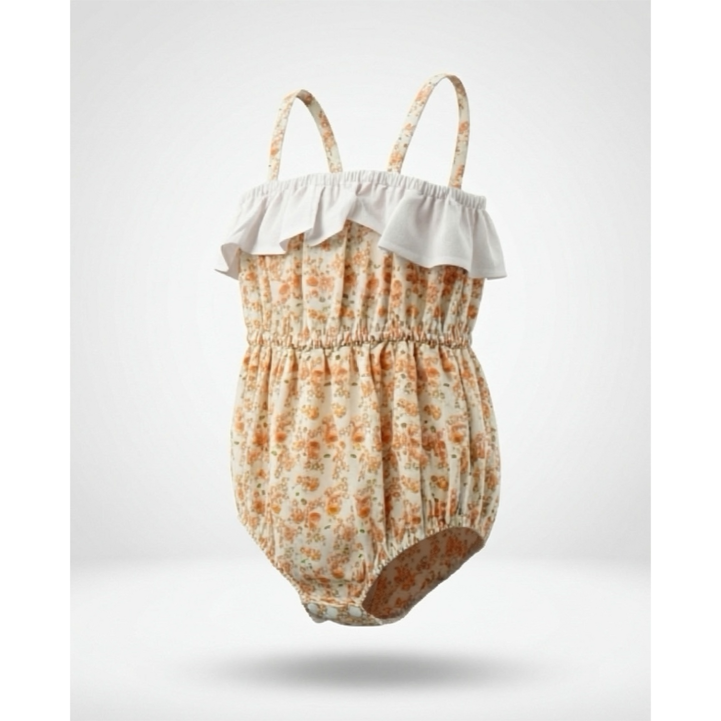 Baby romper with floral pattern and white ruffle on a light gray background