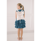 Girl wearing a denim dress with a white lace backpack on a plain background
