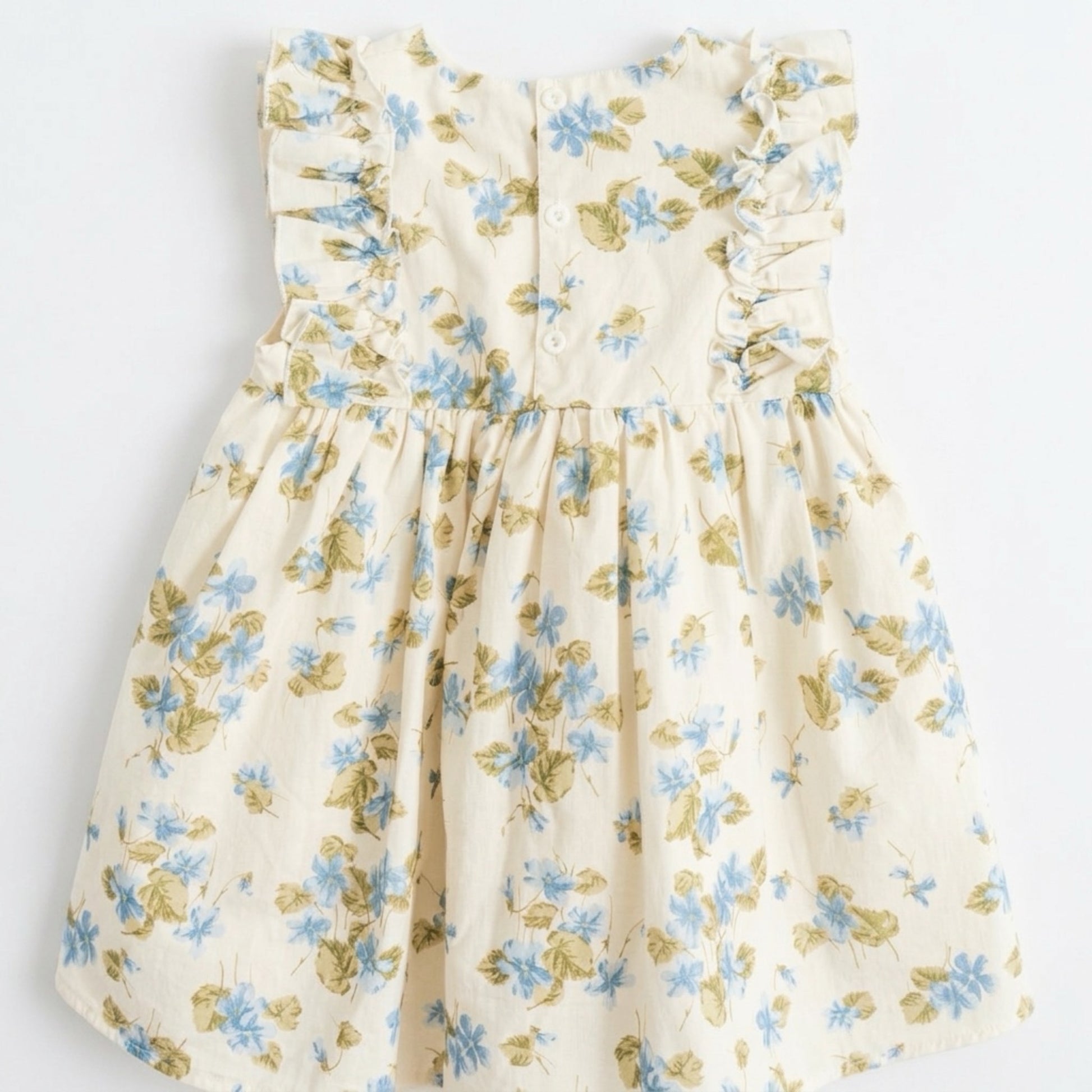 Floral dress with blue and green flowers on a white background