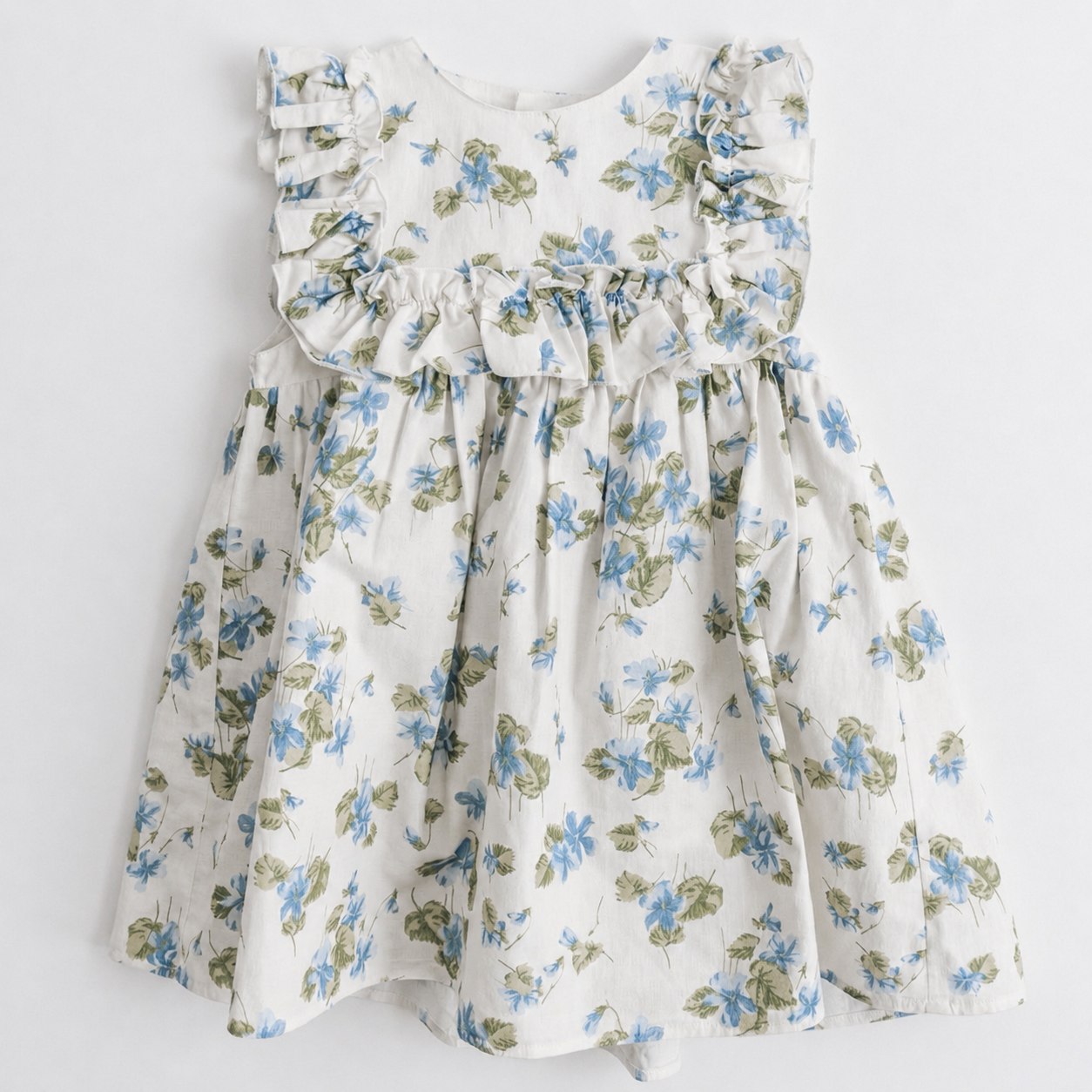 Floral dress with blue and green flowers on a white background