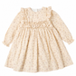 Beige floral dress with long sleeves on a white background
