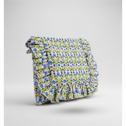 Floral-patterned bag on a light gray background