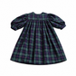 Plaid dress with long sleeves on a white background