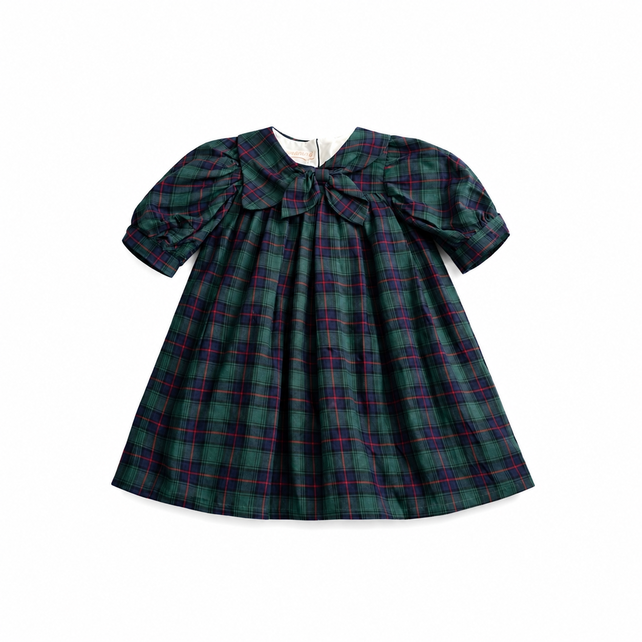 Green plaid dress with a large bow on a white background