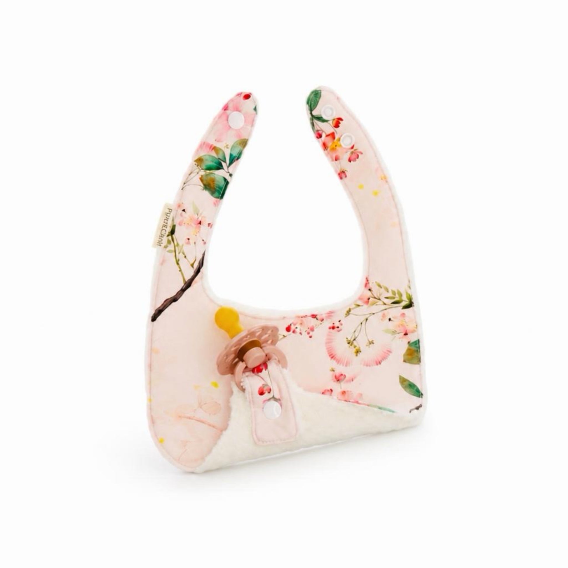 Floral patterned handbag on a white background