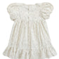 White floral dress with puff sleeves on a white background