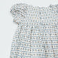 Floral patterned dress on a white background